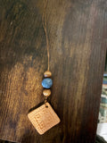 Square ornate diffuser with blue bead